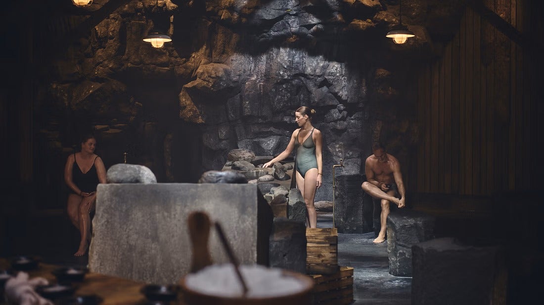 A man and a woman relaxes during one of the seven steps in the bathing ritual at Sky Lagoon.