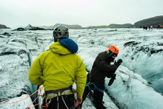 Crevasses and ice formations dot the Icelandic glacier.