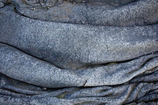 The cooled lava creates unique rock formations.