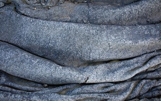 The cooled lava creates unique rock formations.