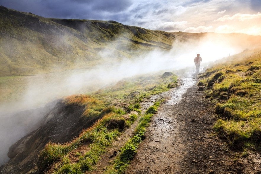 Reykjadalur valley's river are hot and steaming. 