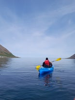 Kayaking on the Siglufjordur fjord in North Iceland is a peaceful and relaxing experience.