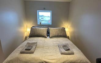 Cozy bedroom at Nordurgata 43 apartment in Akureyri, North Iceland.