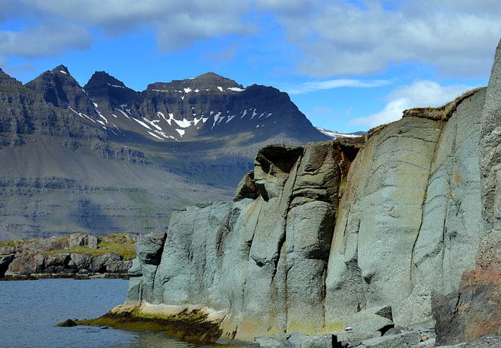 The amazing turquoise Blábjörg Cliffs in Berufjörður in East Iceland