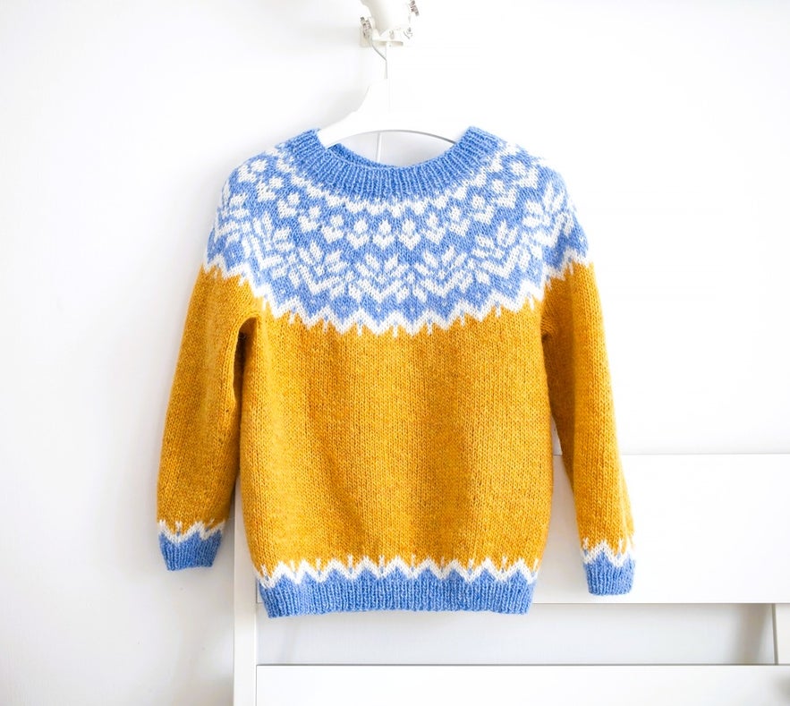 Traditional Icelandic lopapeysa sweater, a cozy essential for what to wear in Iceland during cold weather.