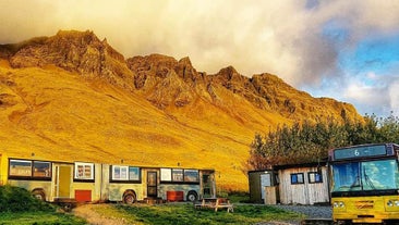 Esjan glamping accommodation near Reykjavik boasts an idyllic countryside setting with Esja mountain as the backdrop.