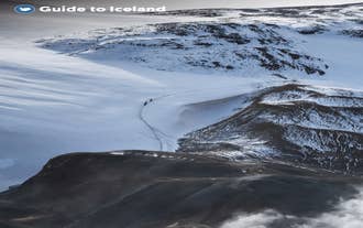 A snowy mountain landscape in the Icelandic Highlands.