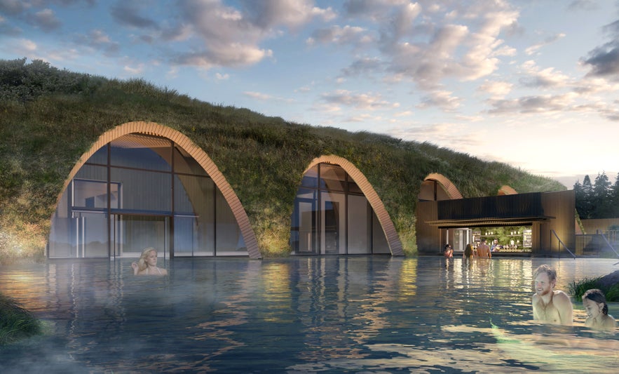 Guests enjoying the geothermal waters at Laugaras Lagoon, with turf-roofed spa buildings and lagoon bar in view.
