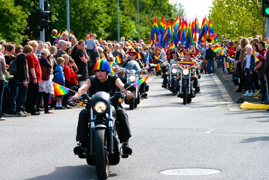 Motorcycles lead a rainbow-filled parade during Reykjavik Pride, one of the top festivals in Iceland celebrating diversity.
