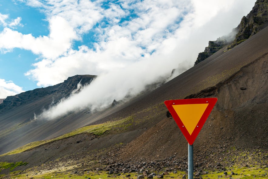 The give way sign in Iceland is an upside-down yellow triangle with a red border.