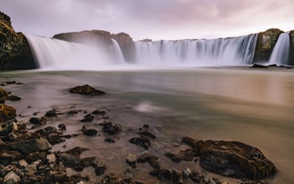 The dramatic cascades of Godafoss Waterfall in North Iceland.