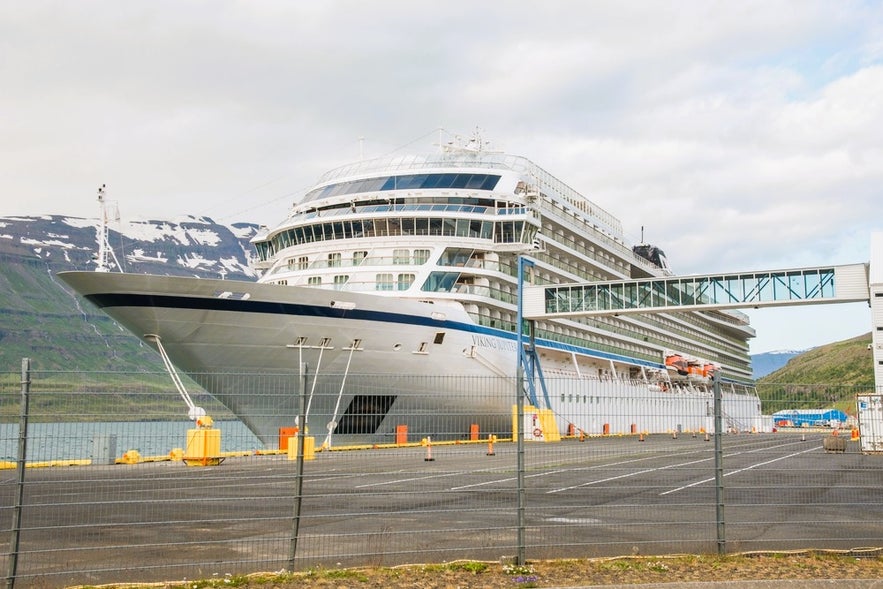 Viking cruise ship docked in Seydisfjordur, a scenic East Iceland port visited on Iceland by cruise ship tours.