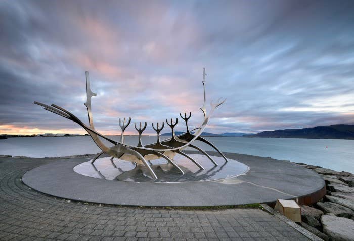 The Sun Voyager sculpture on the Reykjavik waterfront under October cloud, one of Iceland's wettest months.