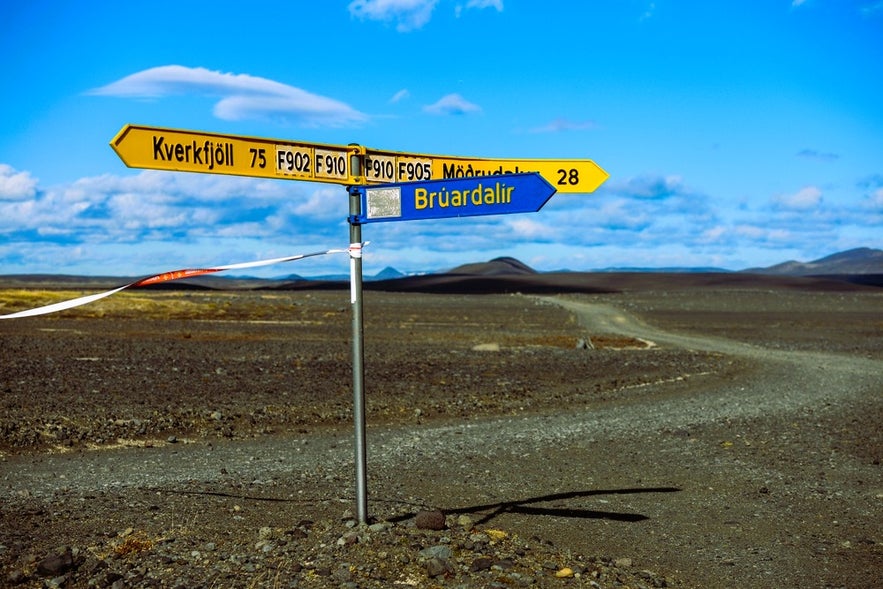 F-road signpost to Kverkfjoll and Modrudalur in the Highlands while driving in Iceland in August on remote routes.