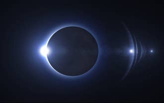 Total solar eclipse with the glowing corona visible during totality over Iceland.