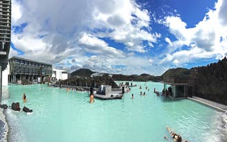 People bathe in the Blue Lagoon geothermal spa in Iceland.