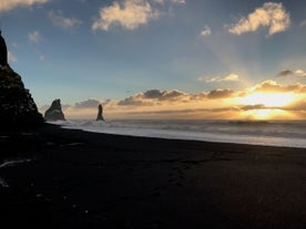 Experience the captivating beauty of Reynisfjara Beach, where stunning black sands meet the powerful Atlantic waves.