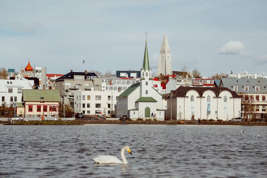 Frikirkjan church alongside other buildings along the waterfront in Reykjavik.