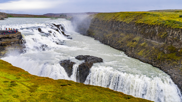 Gullfoss Waterfall captivates with its powerful cascades and rugged beauty.