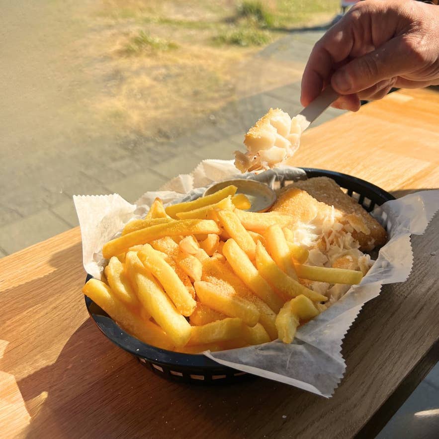 Sun-lit plate of fish and chips from Fish and Chips Lake Myvatn