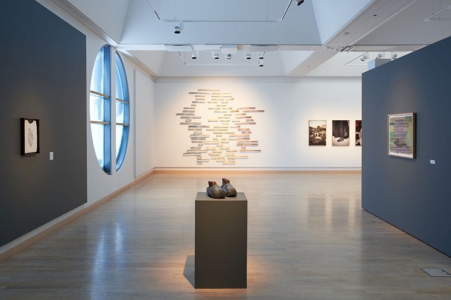 The inside of Gerdarsafn, showing the exhibition space as well as the buildings round windows