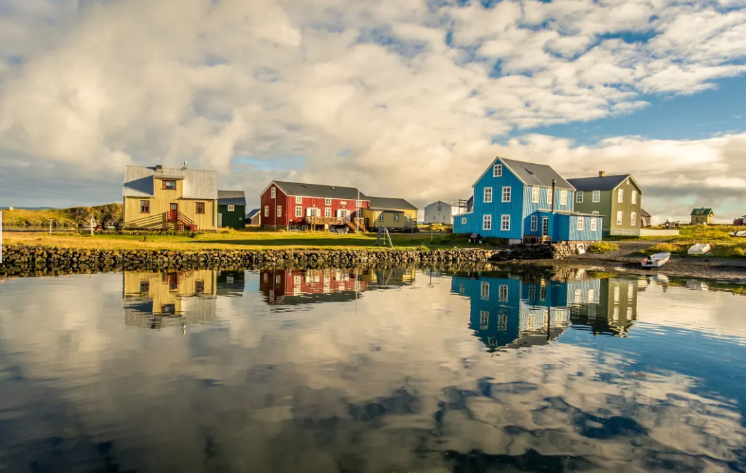 Charming and colorful houses line the streets of Flatey, inviting you to step back in time and enjoy the tranquility of this picturesque island.