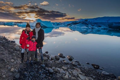 A serene view of Jokulsarlon glacier lagoon with its shimmering icebergs in various shades of white and blue, is a sight to behold and a photographer's dream come true.