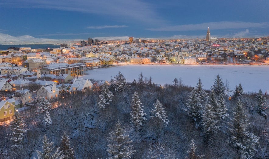 Reykjavik in winter, arial shot showing the Tjornin pond, the City Hal, Hallgrimskirkja, the National Gallery of Iceland and many more locations