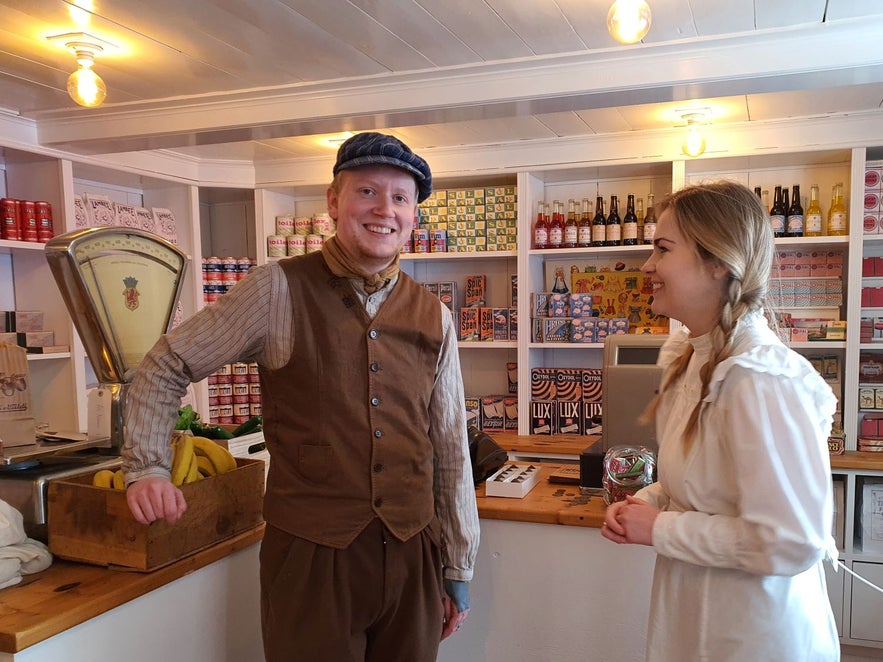 Museum staff at the Adalstraeti exhibition in Reykjavik in the oldest house in the city