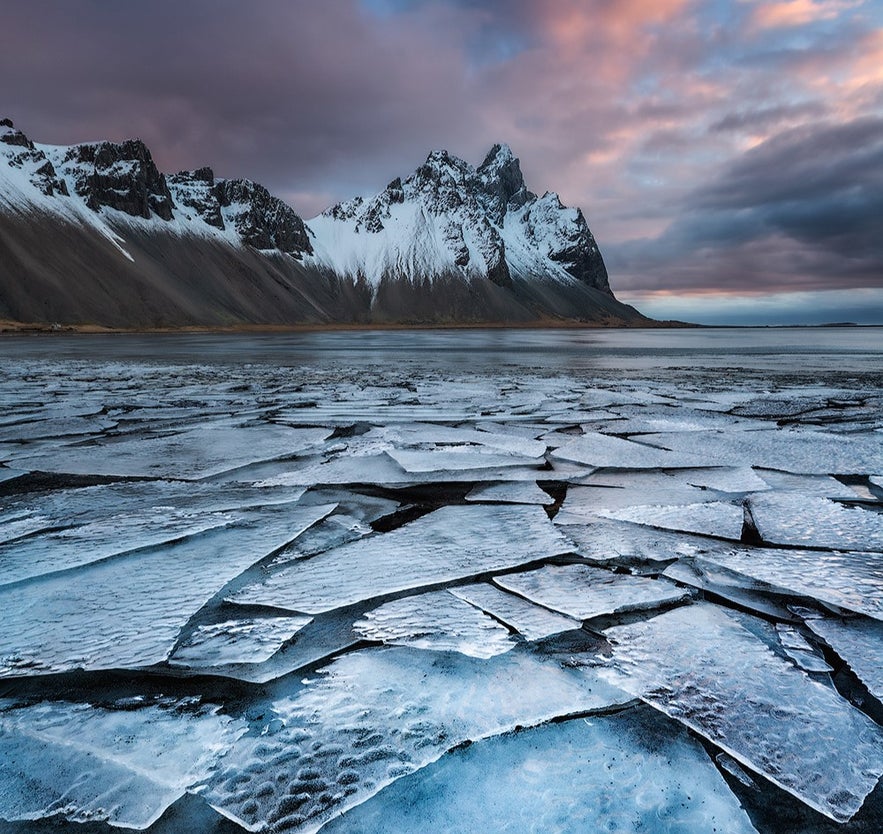Vestrahorn mountain in Iceland during winter with ice on the ocean shore Vestrahorn mountain in Iceland during winter with ice on the ocean shore