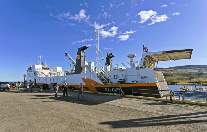 Baldur ferry to Iceland’s Westfjords docked in Stykkisholmur, carrying cars and passengers with Flatey Island stop en route.