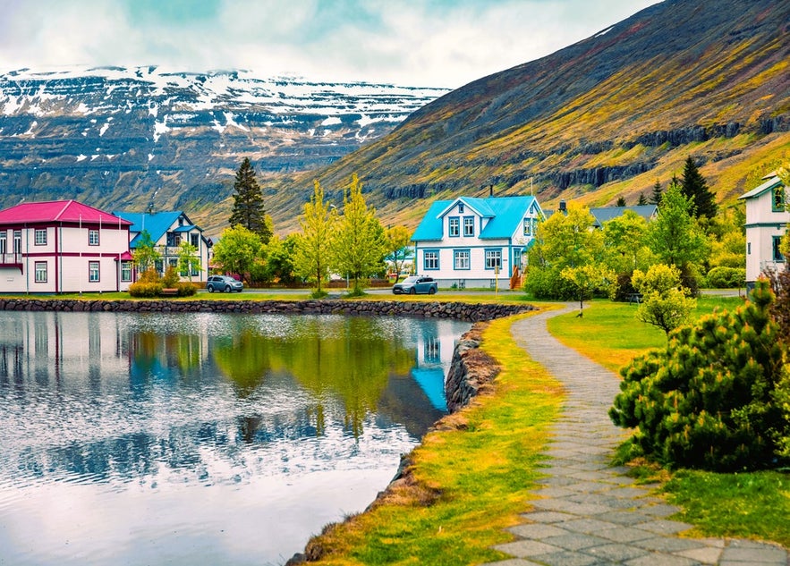 Strolling along the scenic Seydisfjordur waterfront with colorful houses is one of the top things to do in Seydisfjordur.
