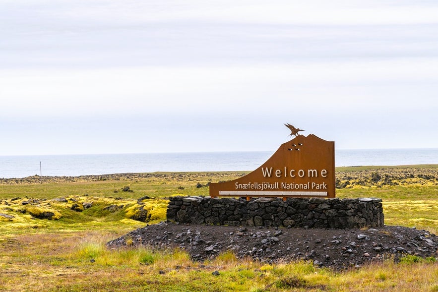 Welcome sign at Snaefellsjokull National Park in Iceland, the gateway to Saxholl Crater and the Snaefellsnes Peninsula.