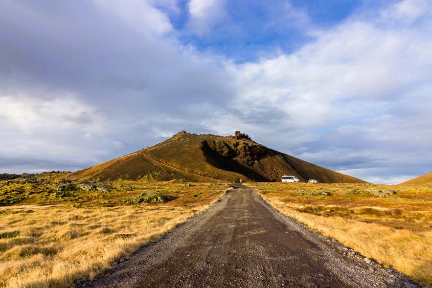 Road leading to Saxholl Crater in Snaefellsjokull National Park, Iceland, with scenic volcanic landscapes in the Snaefellsnes Peninsula.