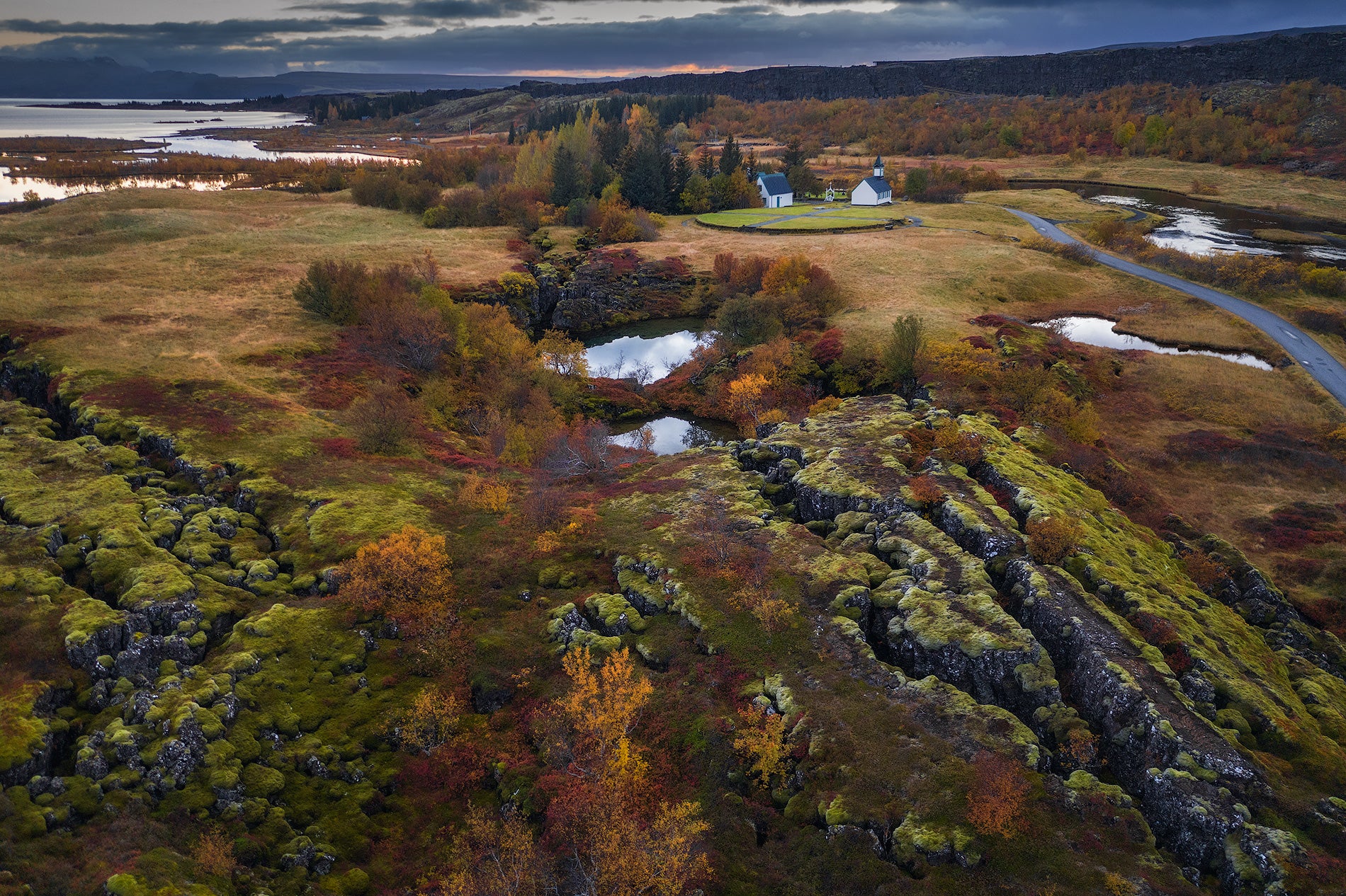 Aerial view of Thingvellir National Park in southwest Iceland, home to Almannagja Gorge, shows huge cracks in the rocky landscape.