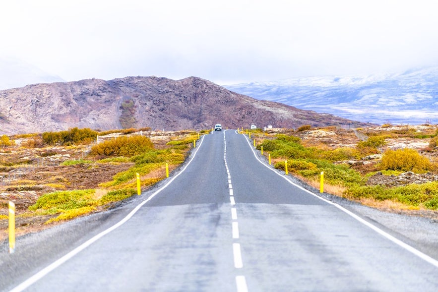 Scenic drive to Faxafoss Waterfall in Iceland along the Golden Circle near Thingvellir and Skalholt with mountain views.