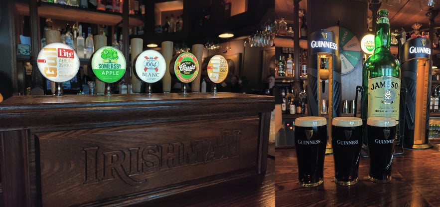Bar taps, pints of Guinness, and Jameson whiskey on the counter at The Irishman Pub in Reykjavik.