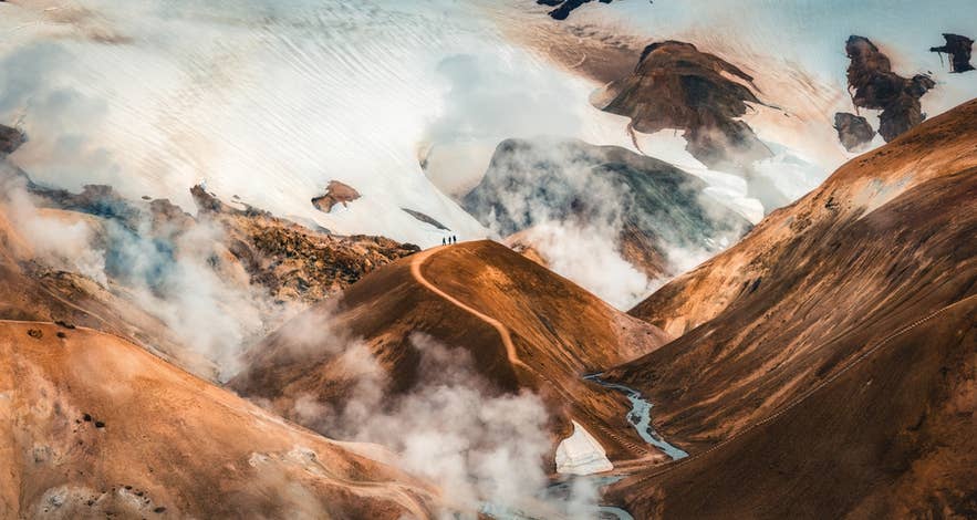 Kerlingarfjoll Mountain Range with colorful volcanic terrain, steam, and snow.