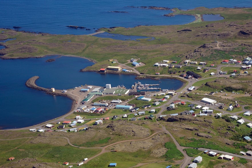 Aerial view of Djúpivogur in East Iceland, showing the harbor and coastline.